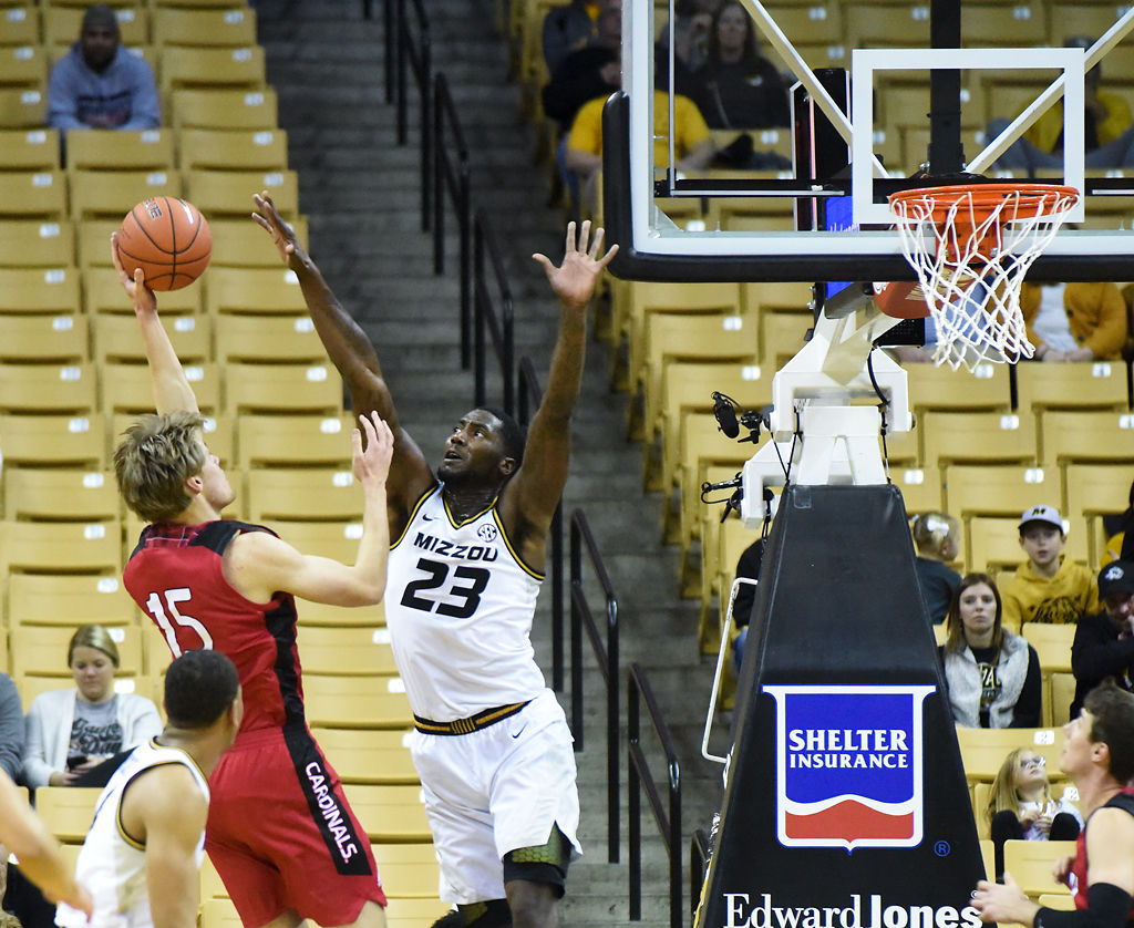 Jeremiah Tilmon jumps to block the shot of Incarnate Word